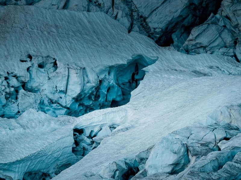 Stunning icy formations of glacier landscape in Haute-Savoie, France, showcasing nature's raw beauty.