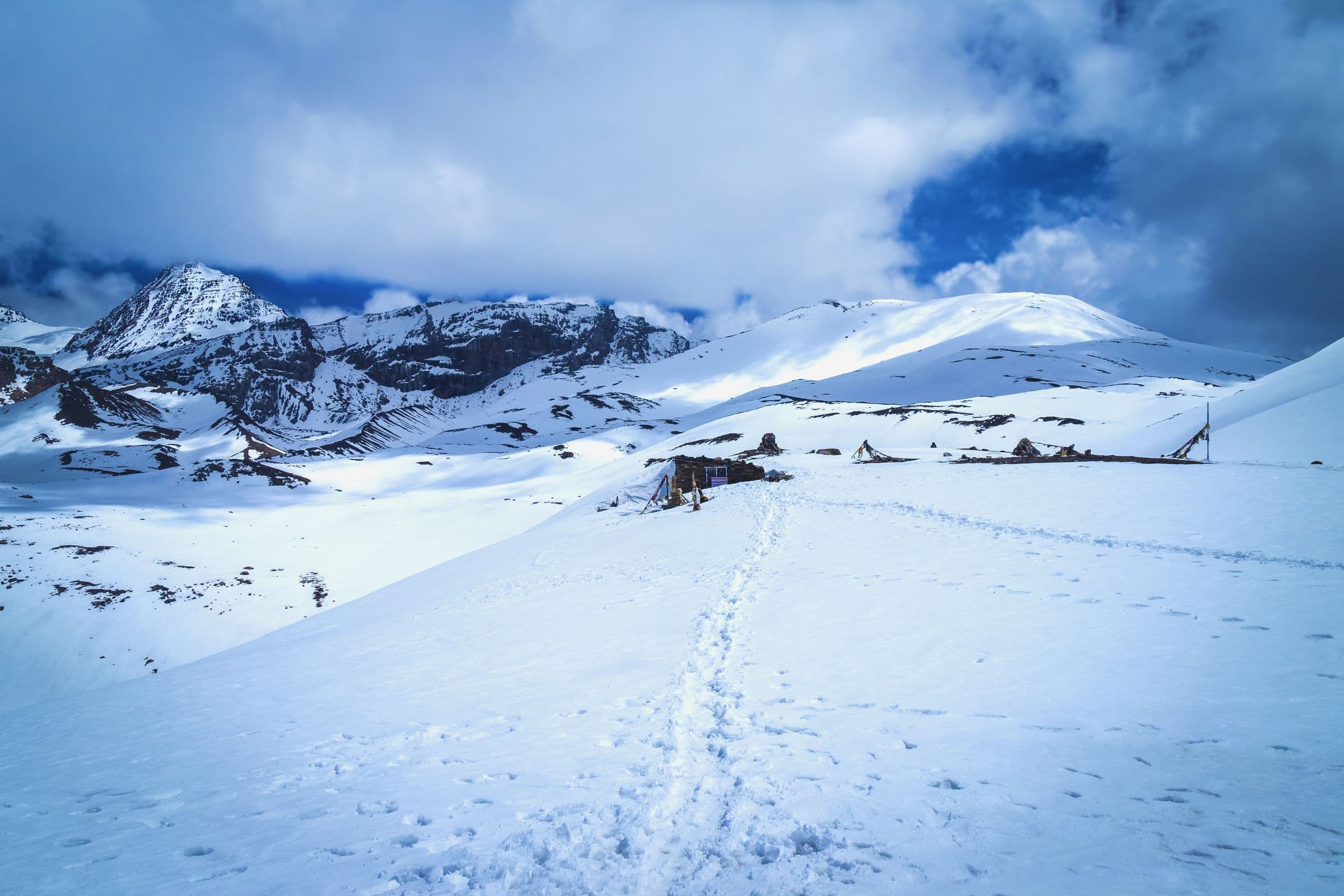 Breathtaking snowy landscape of Manang in Nepal's Himalayas. Ideal for adventure or travel themes.